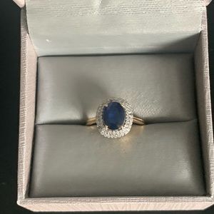 Blue sapphire yellow gold ring with diamonds. Size 8 selling as is.